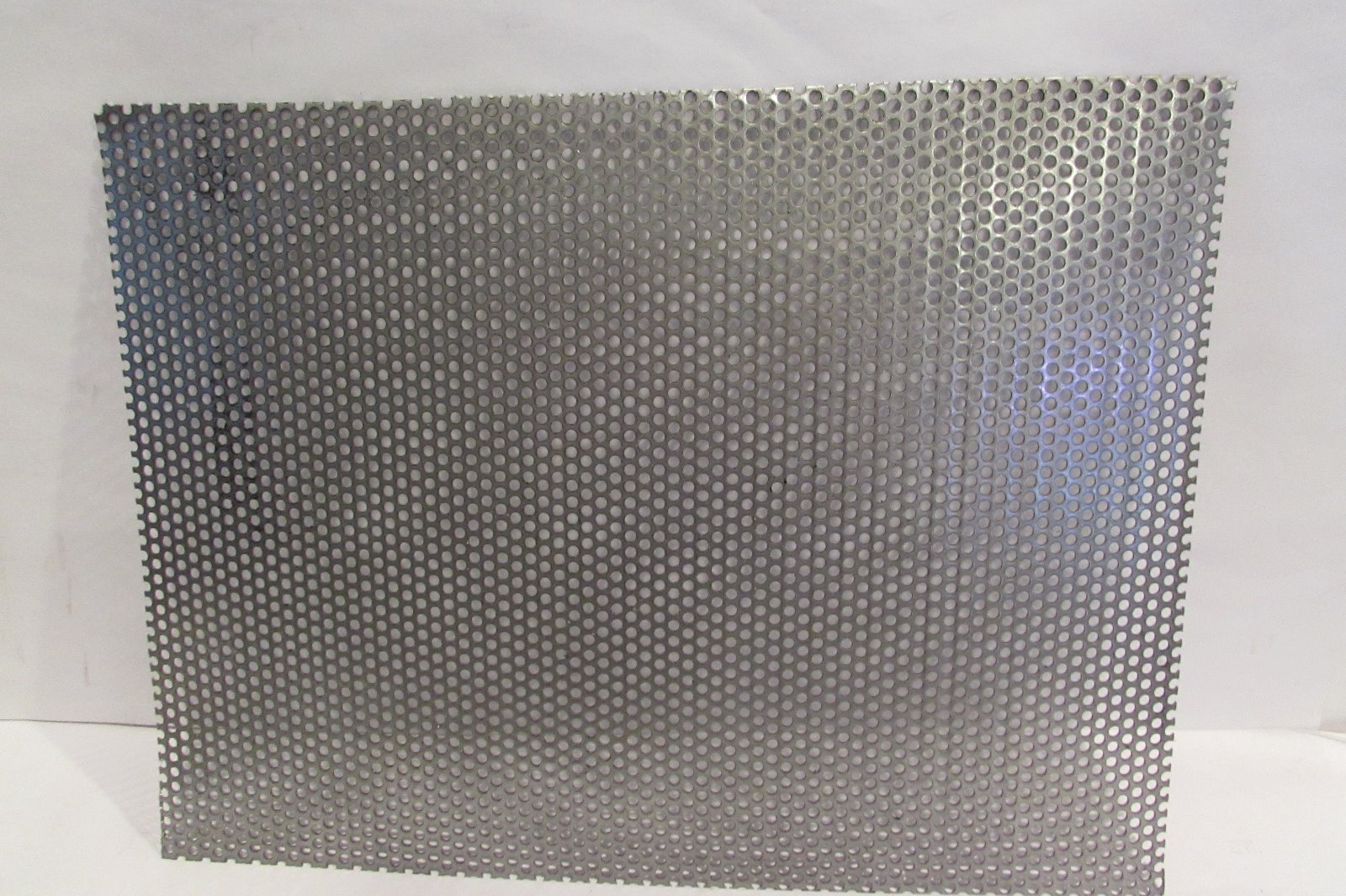 1/8″ HOLES ON 3/16″ CENTERS–20 GAUGE STAINLESS PERFORATED– 11″ x 10″