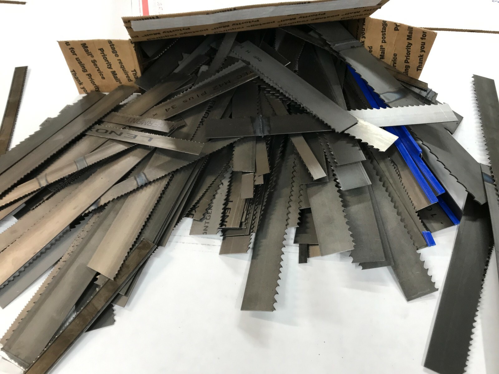 25lb of Scrap Band Saw Blade Ends (Many Brands and Types up to 1′ Long)