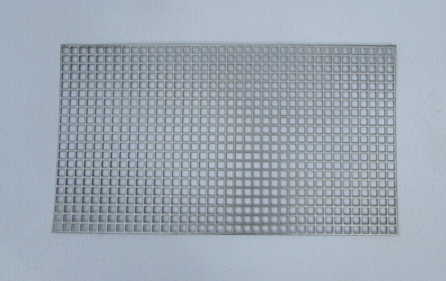 3/8″ SQUARE ON 1/2″ CENTERS 16 GA STAINLESS STEEL PERFORATED -18-3/4″ x 20-3/4″