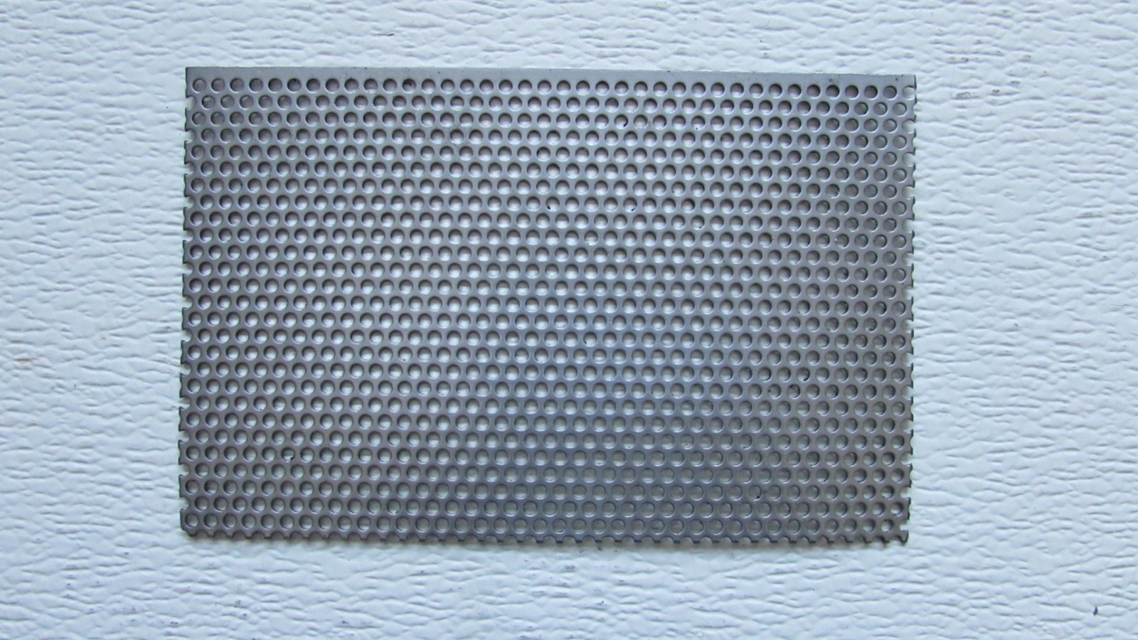 1/8″ HOLES-18 GAUGE– 304 STAINLESS STEEL PERFORATED SHEET –4-1/4″ X 7″