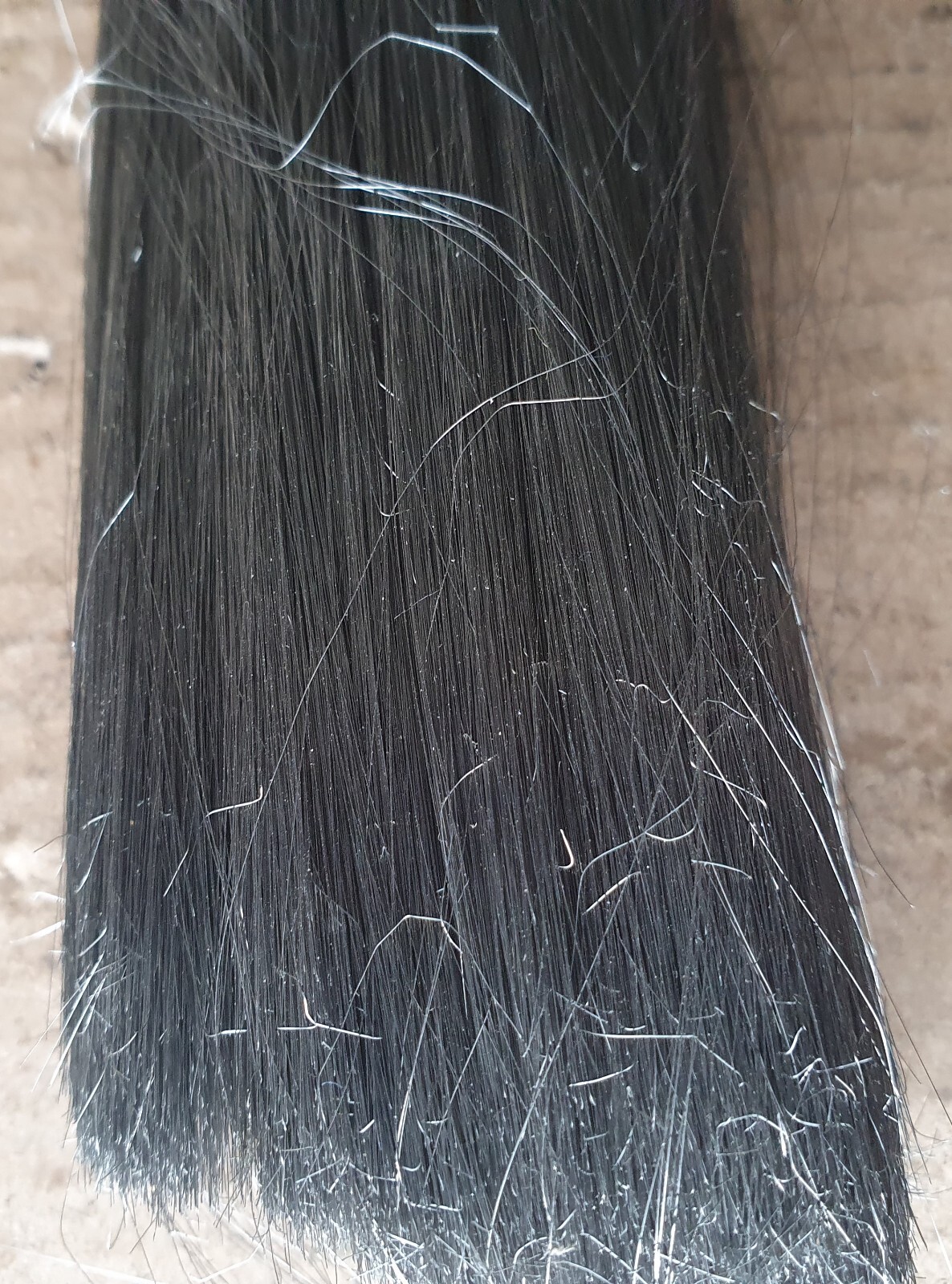 A strand of nickel alloy wires with a thickness of 0.050 mm.