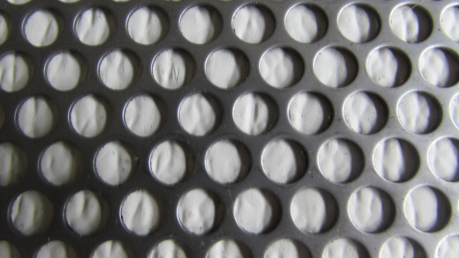 1/4″HOLES ON 5/16″CENTER–20 GA. –12″ x 12″ STAINLESS PERFORATED SHEET