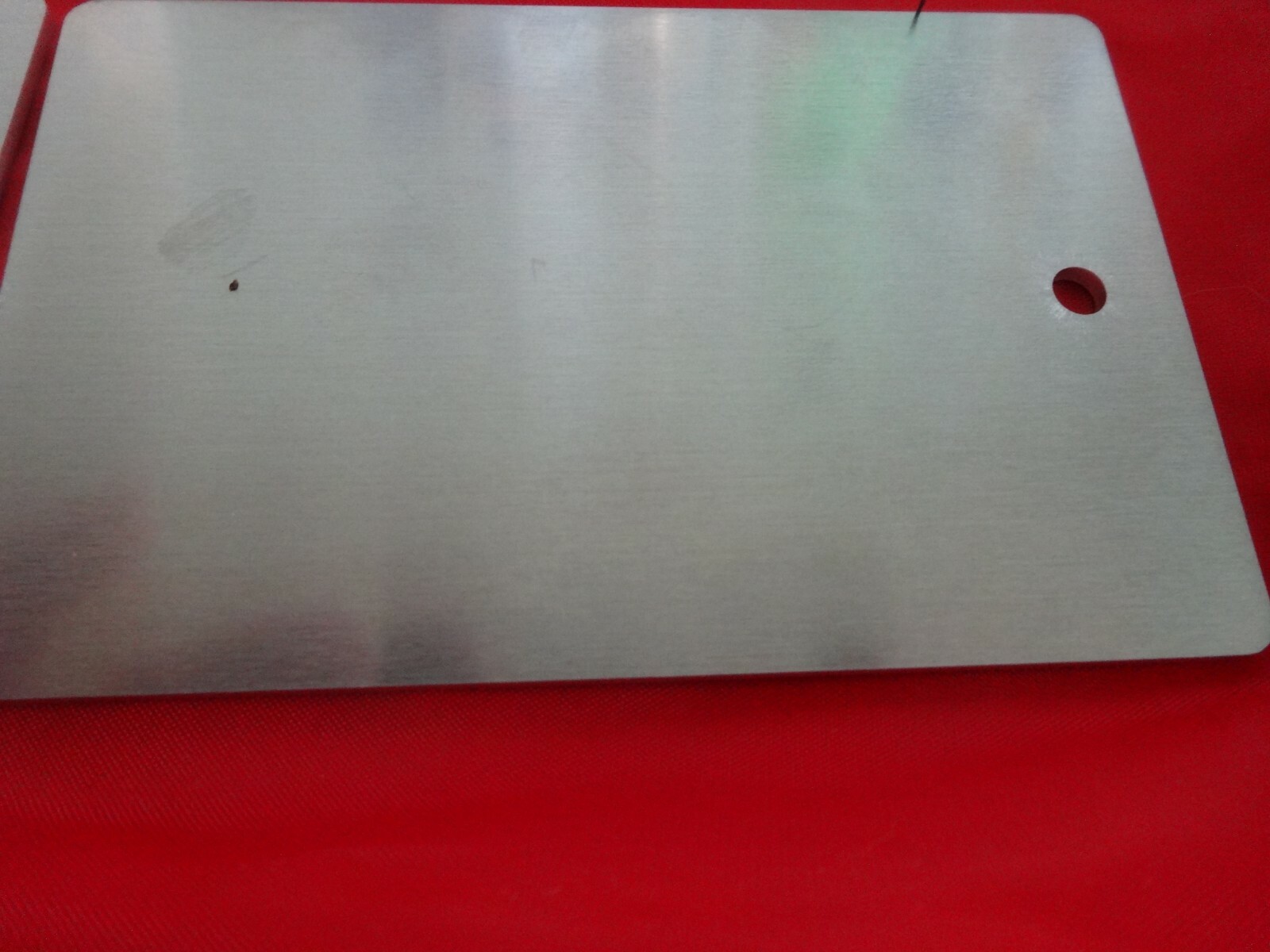 .080 Aluminum Sheet lasered tags 2 5/8″ x 4 1/16″ with 1/8 hole. 5 pieces