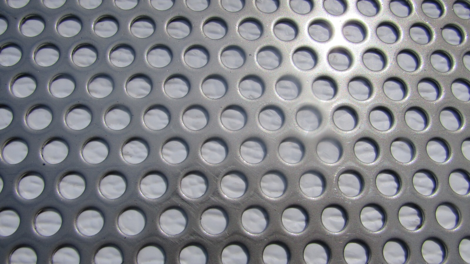 1/4″ HOLES ON 3/8 CENTERS – 16 GA.- STAINLESS PERFORATED SHEET—4″ X 11-1/2″