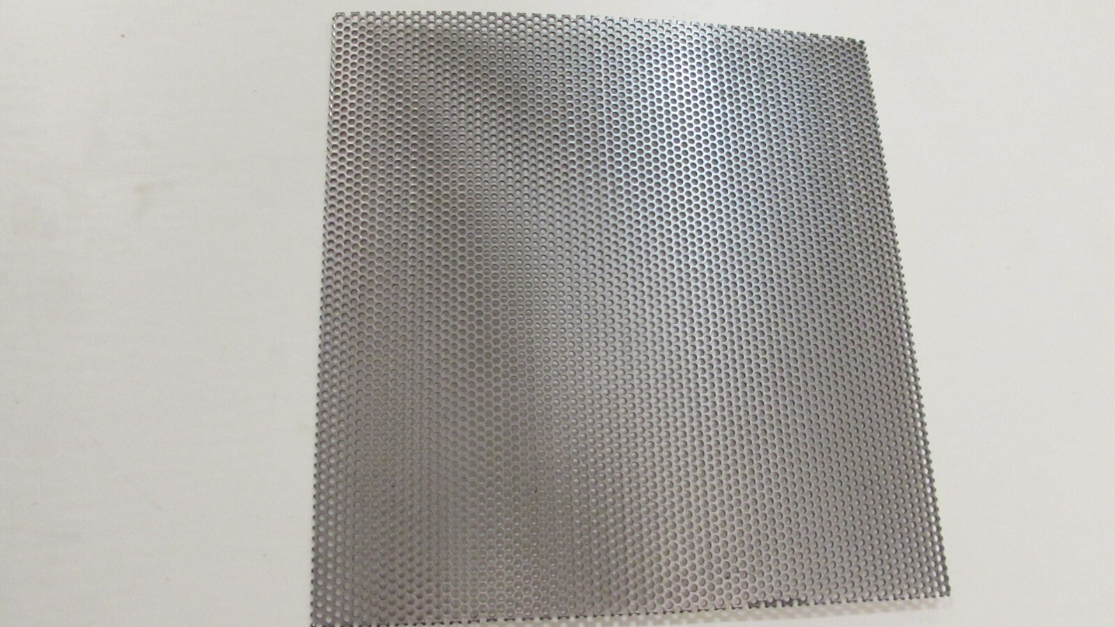 1/16 HOLES ON 3/32 CENTERS-20 GAUGE-304 STAINLESS STEEL–5-1/4″ X 12″