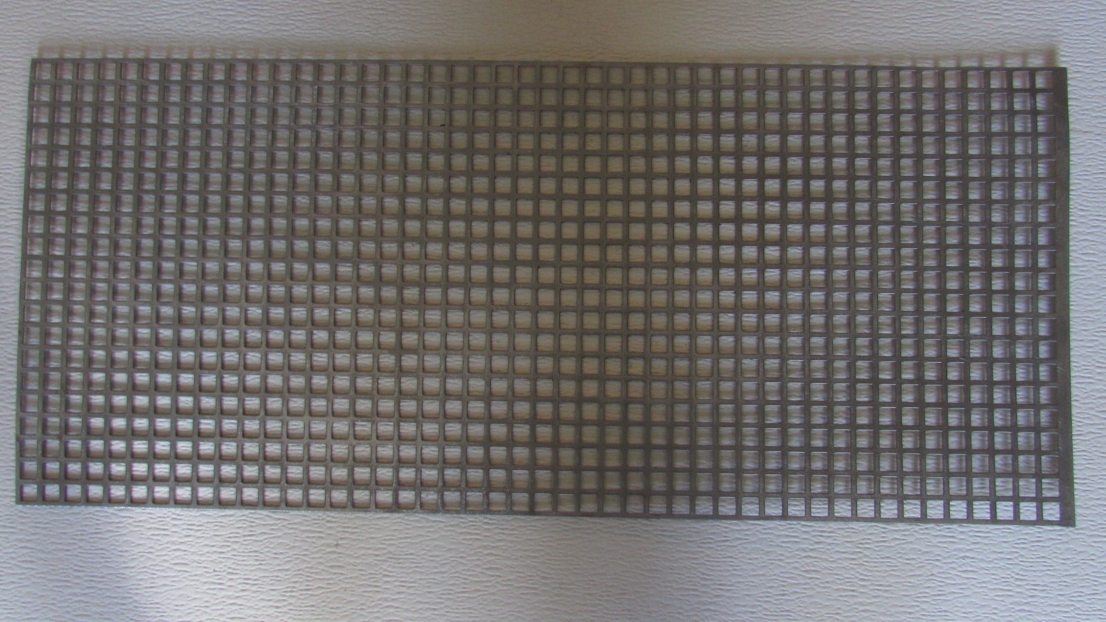 3/8 SQUARE PERFORATED METAL 16 GAUGE–PLAIN STEEL– 10-1/4″ X 29″