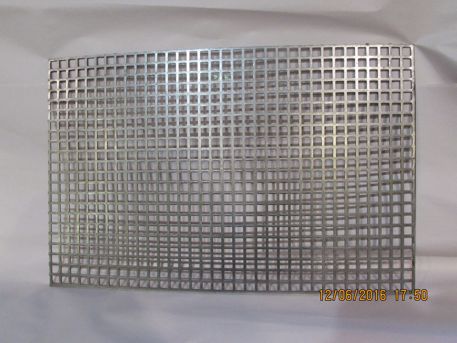 3/8″ SQUARE HOLE CARBON STEEL PERFORATED SHEET 5-1/8″ x 5-1/8″