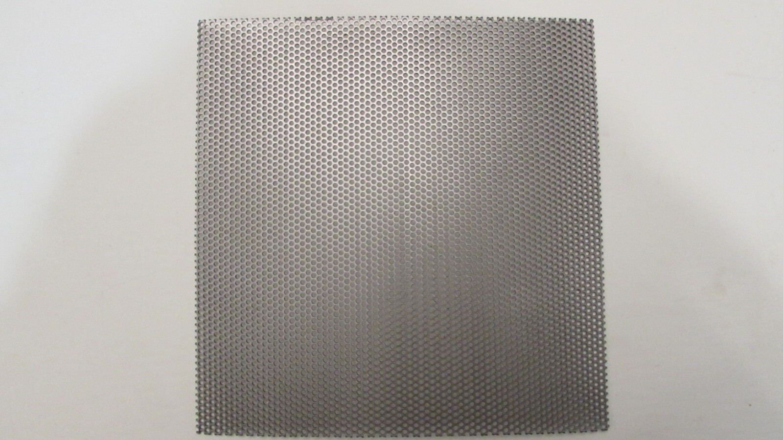 1/16 HOLES ON 3/32 CENTERS-20 GAUGE-304 STAINLESS STEEL–5-1/4″ X 12″