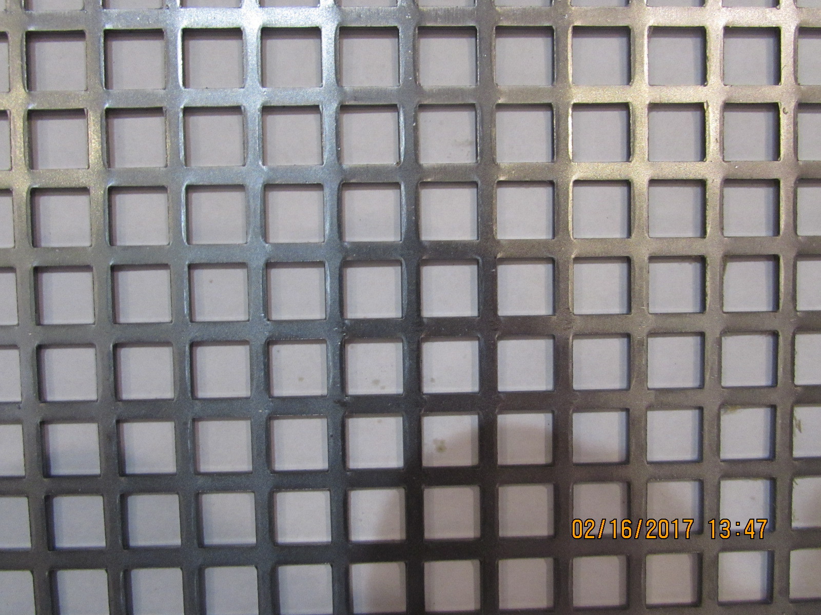 3/8″ SQUARE ON 1/2″ CENTERS PLAIN STEEL PERFORATED METAL 16 GAUGE—18″ X 18″