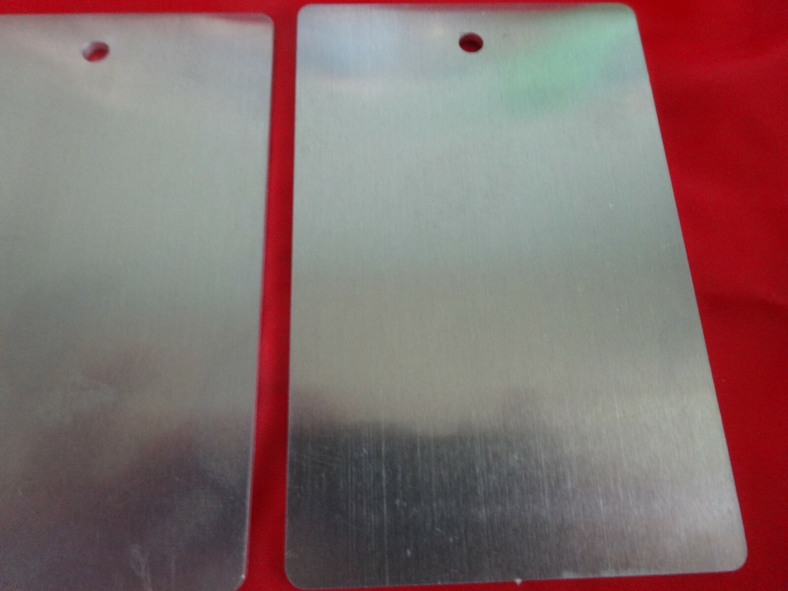 .080 Aluminum Sheet lasered tags 2 5/8″ x 4 1/16″ with 1/8 hole. 5 pieces