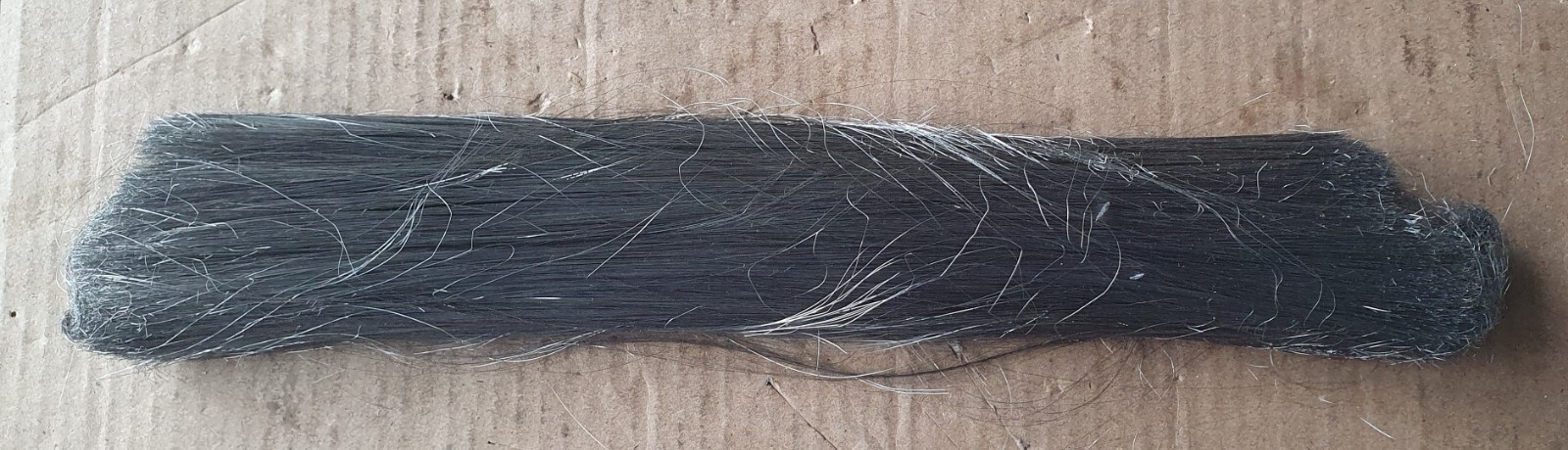 A strand of nickel alloy wires with a thickness of 0.050 mm.