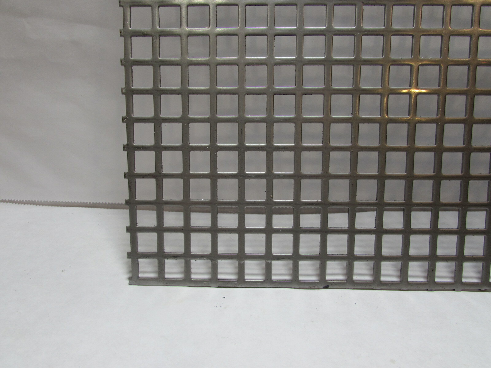3/8″ SQUARE ON 1/2″ CENTERS 16 GA STAINLESS STEEL PERFORATED -7-5/8″ x 13″
