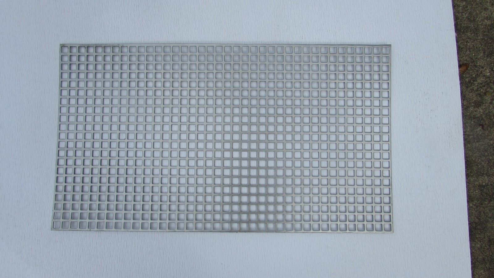 3/8″ SQUARE ON 1/2″ CENTERS 16 GA STAINLESS STEEL PERFORATED -7-5/8″ x 13″