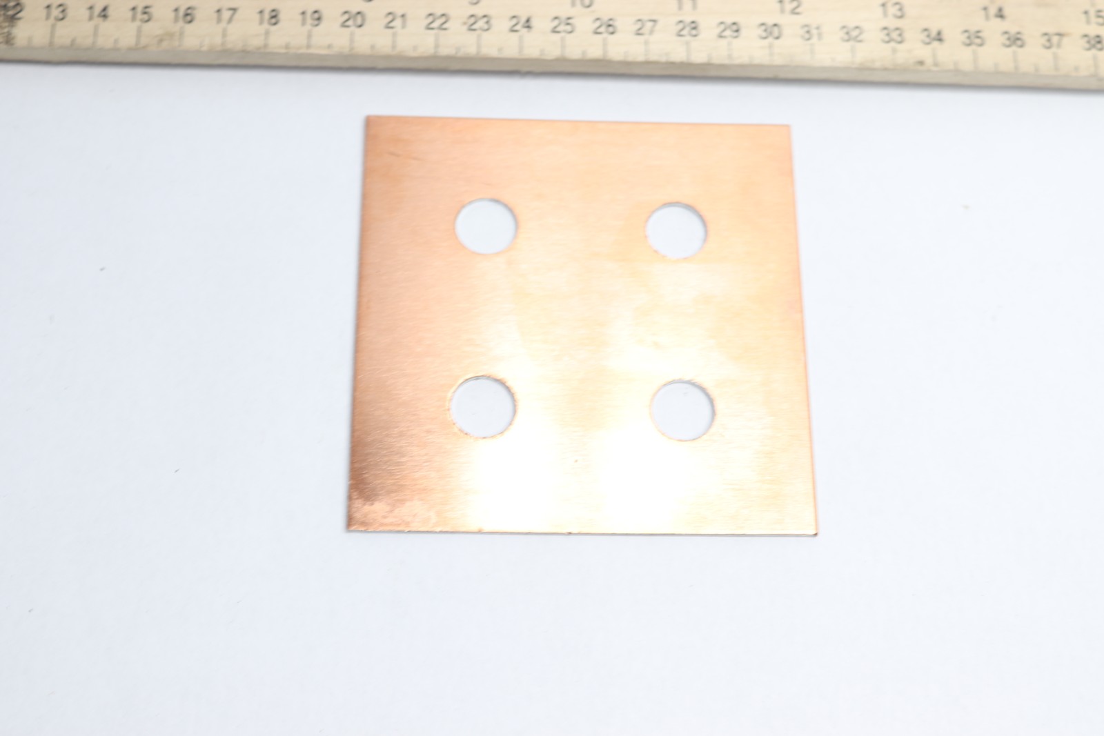 Plate Aluminum 9/16″ Bored 4″ x 4″ x 1/32″ ATP-D