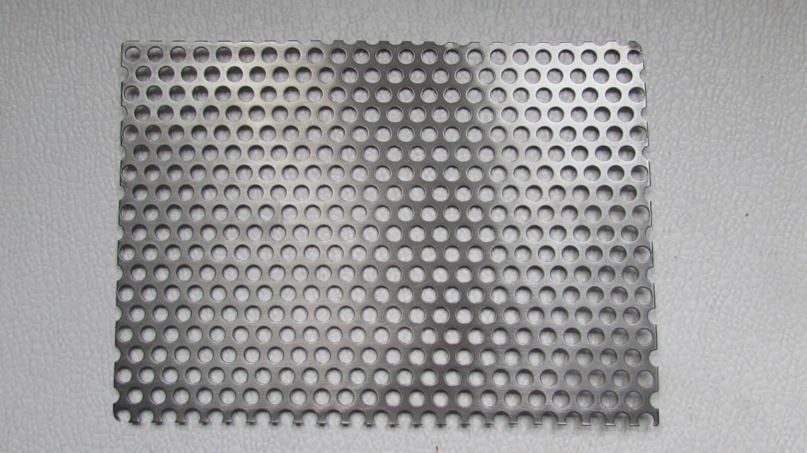 1/4″ HOLE 0N 3/8 CENTERS 18 GAUGE 304 STAINLESS STEEL PERFORATED 12″ X 24″