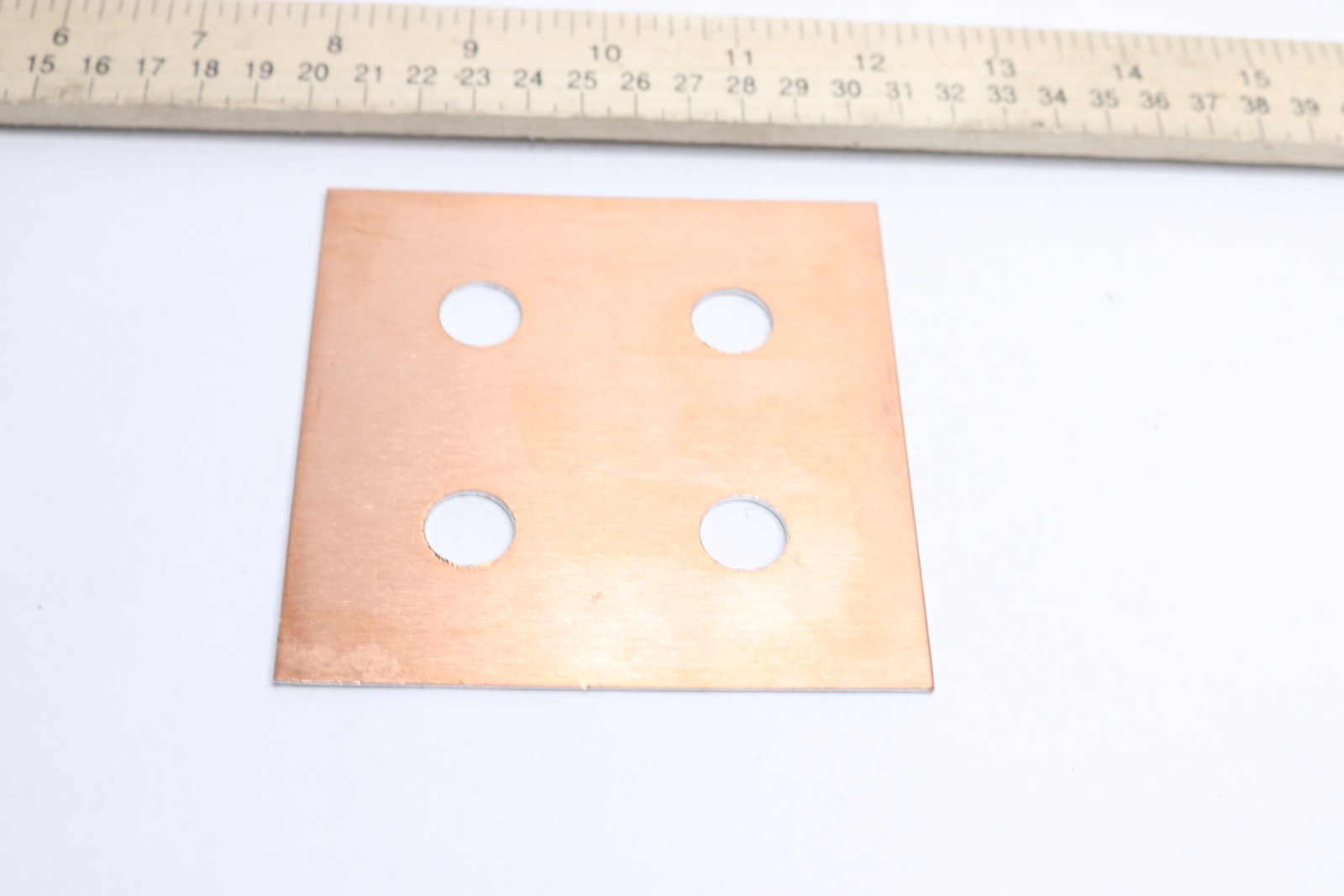 Plate Aluminum 9/16″ Bored 4″ x 4″ x 1/32″ ATP-D