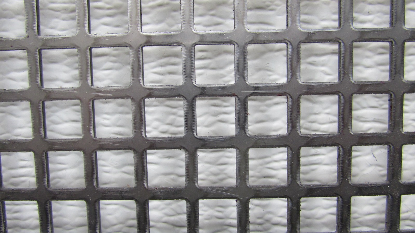 3/8″ SQUARE—- 16 GA. STAINLESS PERFORATED METAL —23″ x 23-1/4″