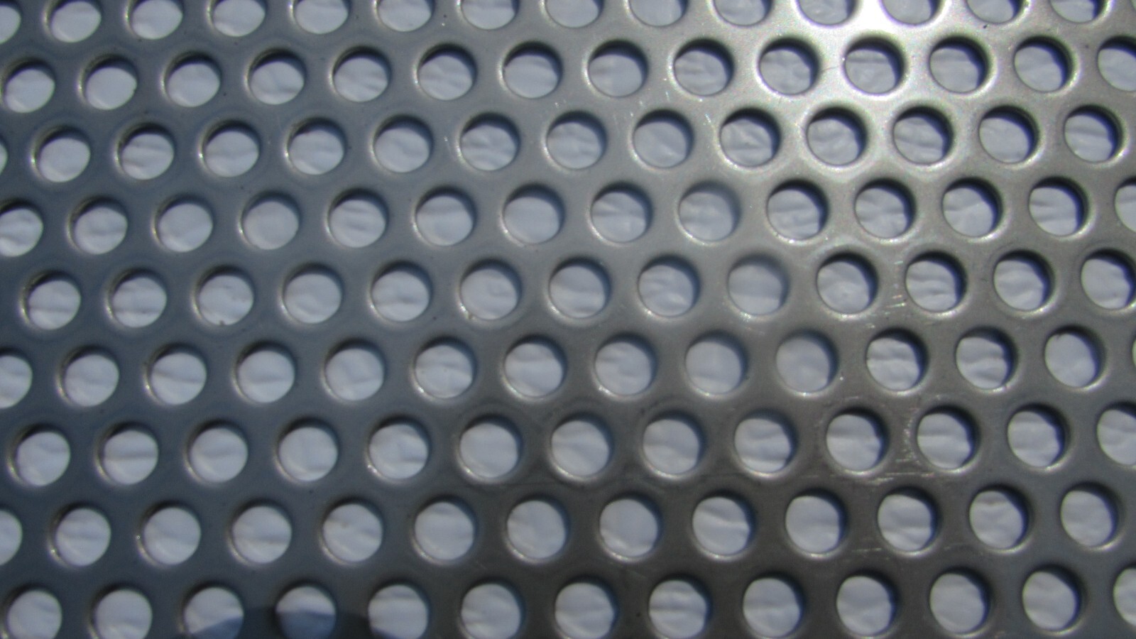 1/4″ HOLES ON 3/8 CENTERS – 16 GA.- STAINLESS PERFORATED SHEET—4″ X 11-1/2″
