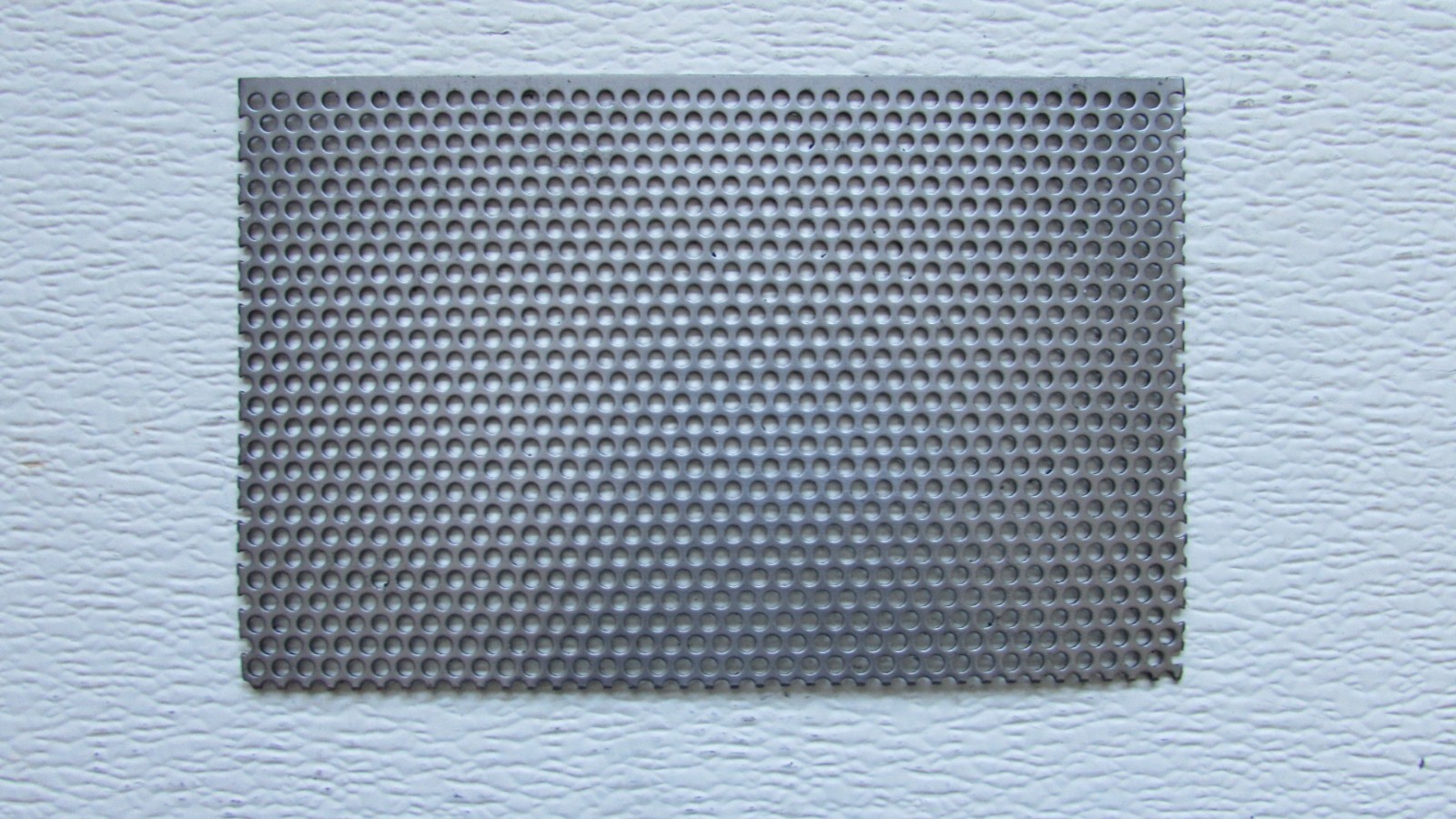 1/8″ HOLES-18 GAUGE– 304 STAINLESS STEEL PERFORATED SHEET –4-1/4″ X 7″