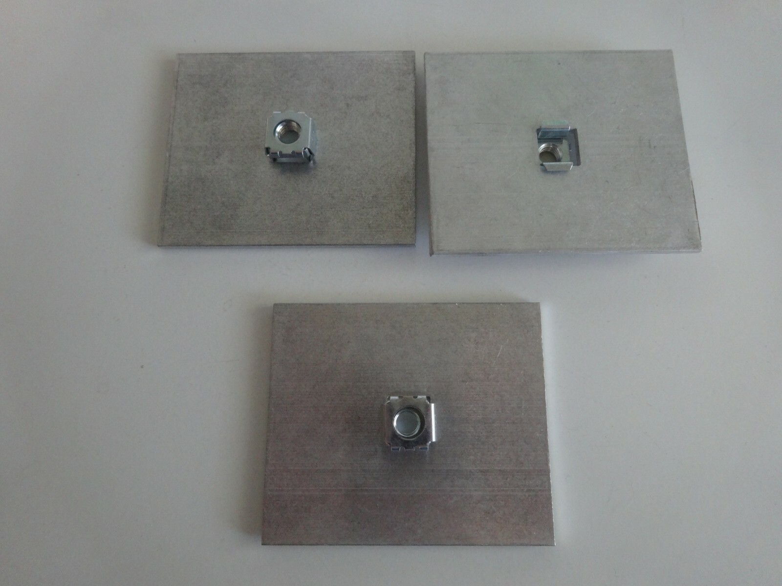 3 Pcs. 1/8 X 3 ALUMINUM FLAT BAR 3 1/2″ in length with 5/16-18 cage nut centered