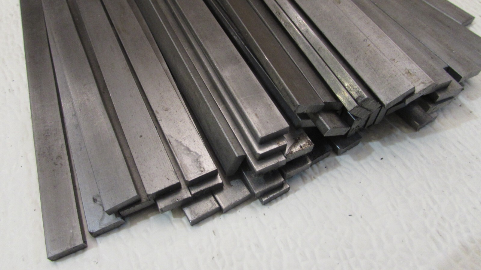 1/8″ THICK X 3/8″ WIDE X 9″ LONG CR 1018 FLAT BAR–200 PIECE LOT
