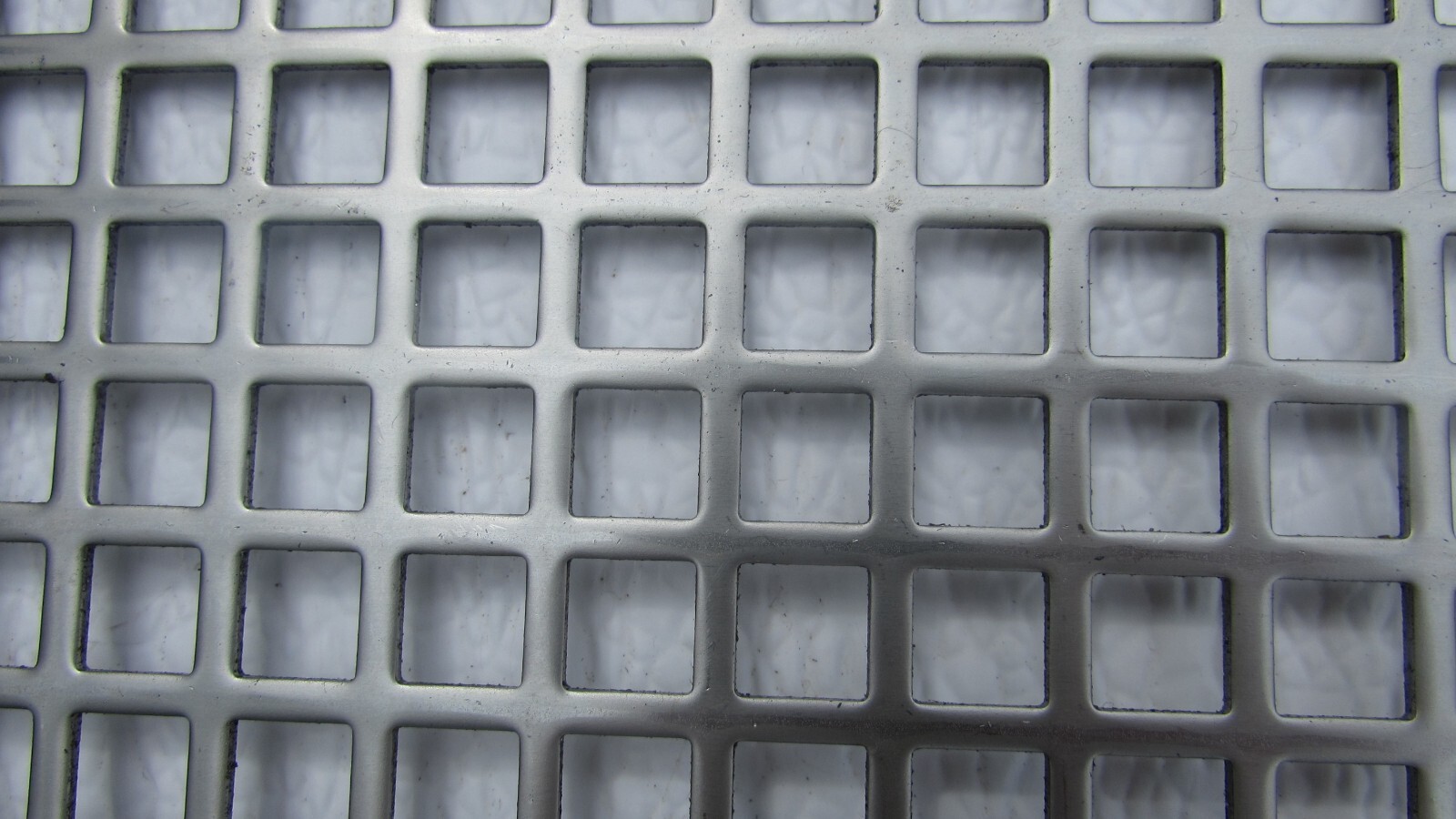 3/8″ SQUARE—- 16 GA. STAINLESS PERFORATED METAL —12″ x 12″