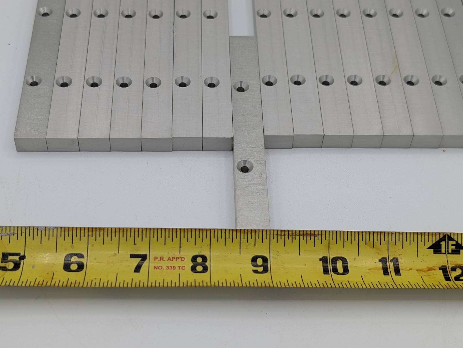 Lot Of 17 Aluminum bracket 3/8″ x 9/16″ x 4 7/8 machined Recessed Tapped 6-32