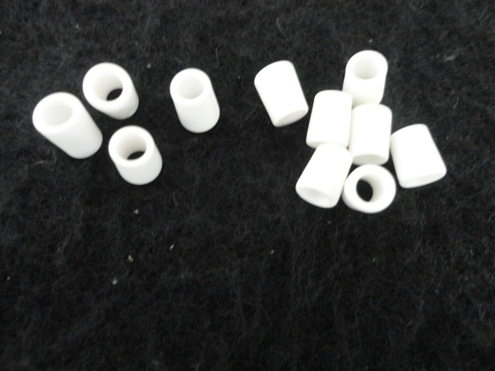 ONE DOZEN HIGH PURITY ALUMINA CERAMIC SHORT TAPERED TUBE SPACER BUSHING. No.: 29