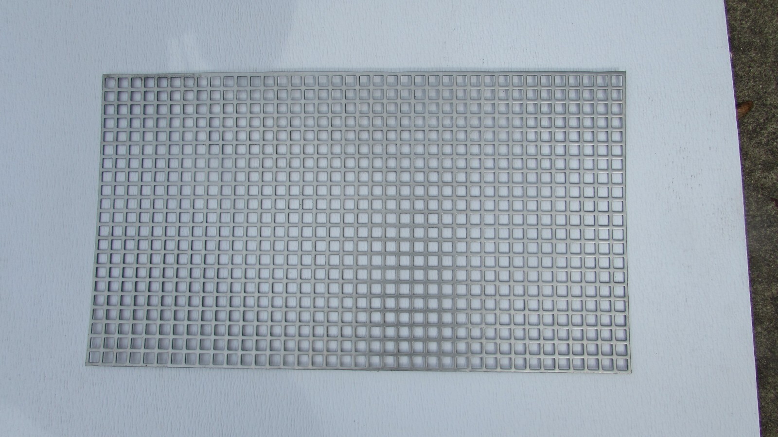 3/8″ SQUARE—- 16 GA. STAINLESS PERFORATED METAL —12″ x 12″
