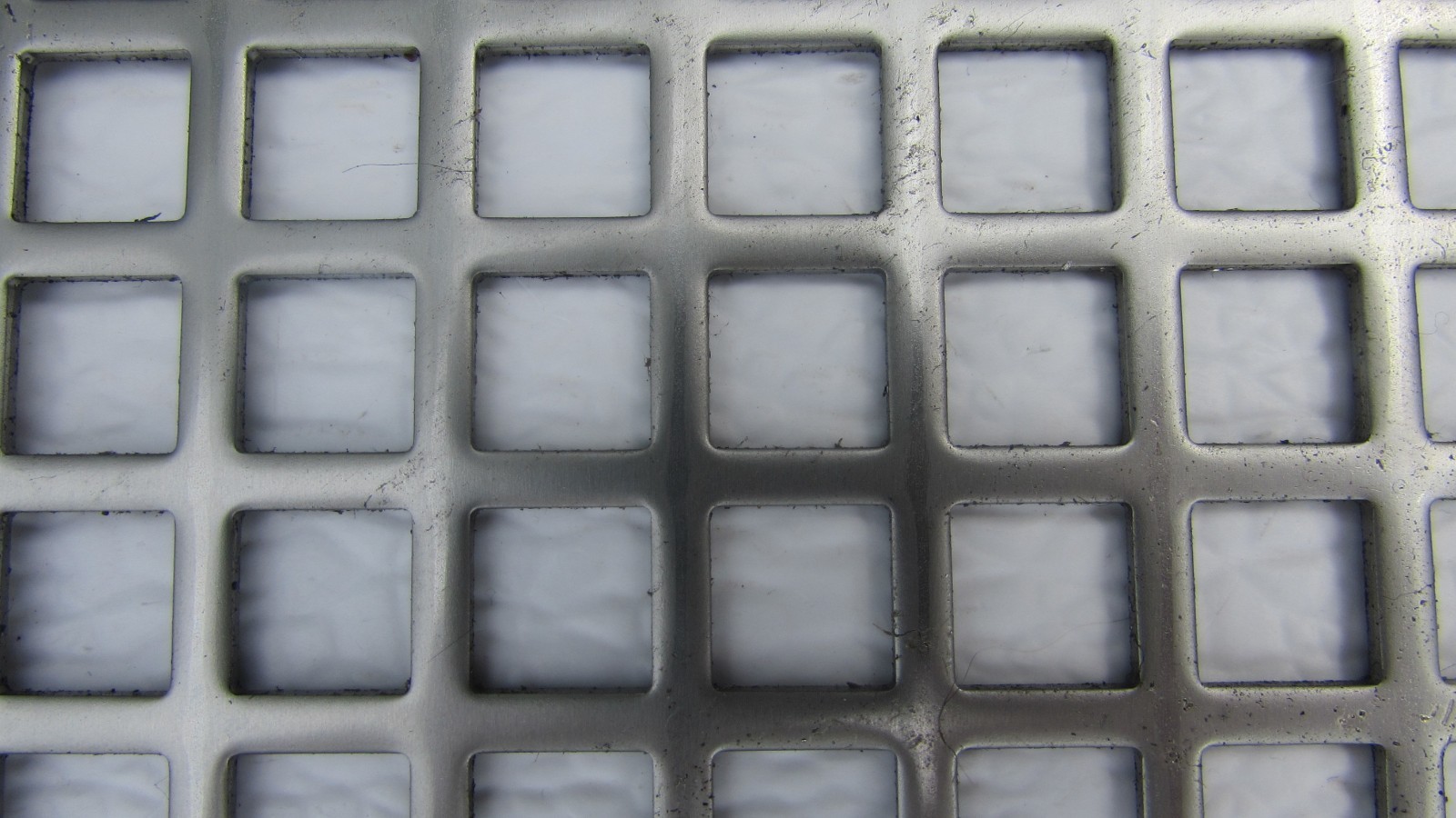 3/8″ SQUARE ON 1/2″ CENTERS PLAIN STEEL PERFORATED METAL 16 GAUGE—18″ X 18″