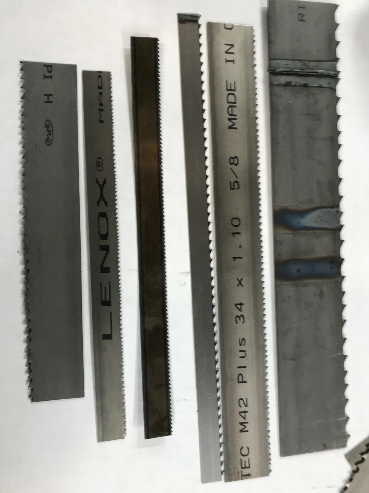 25lb of Scrap Band Saw Blade Ends (Many Brands and Types up to 1′ Long)