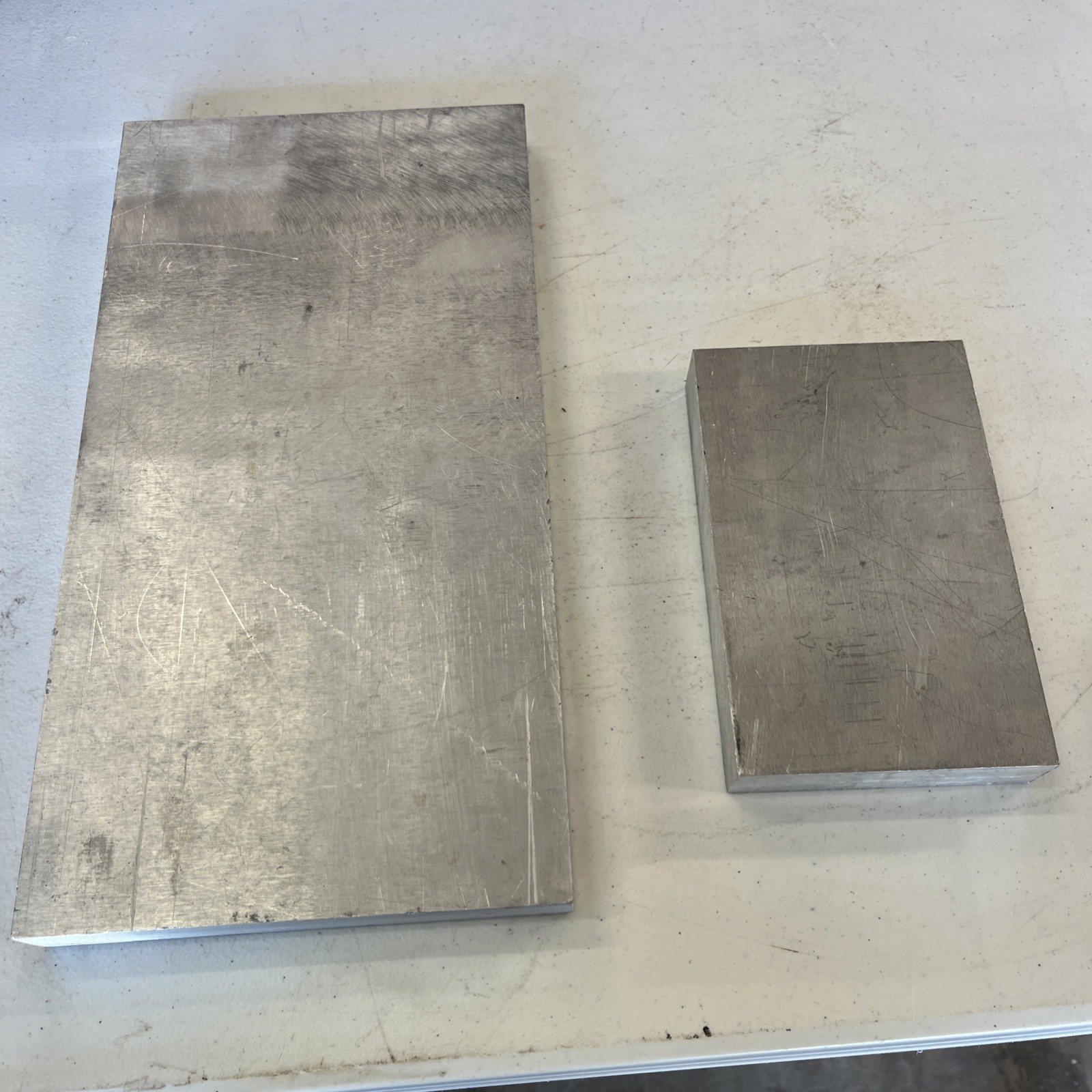 1″ thick Aluminum Lot Of (2). 6 7/8 “X 13 1/8 “X 1” And 4 1/8”x6 1/2”x 1”.