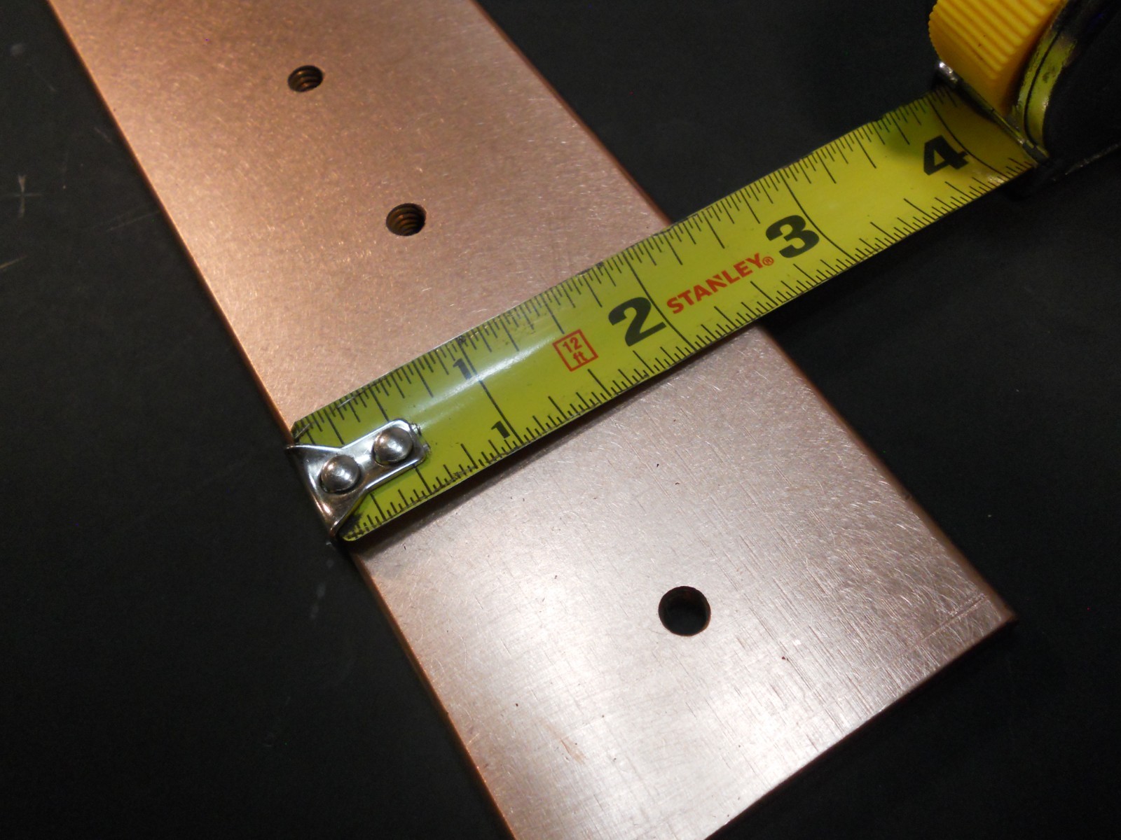 1/4″ thick ,2 3/8″ x 16 3/8″ copper 110 buss bar. Weight 3.2Lb.