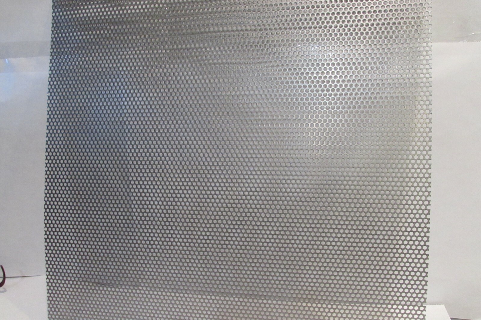 1/4″HOLES ON 5/16″CENTER–16 GA.- STAINLESS PERFORATED SHEET–6-3/4″ X 8″