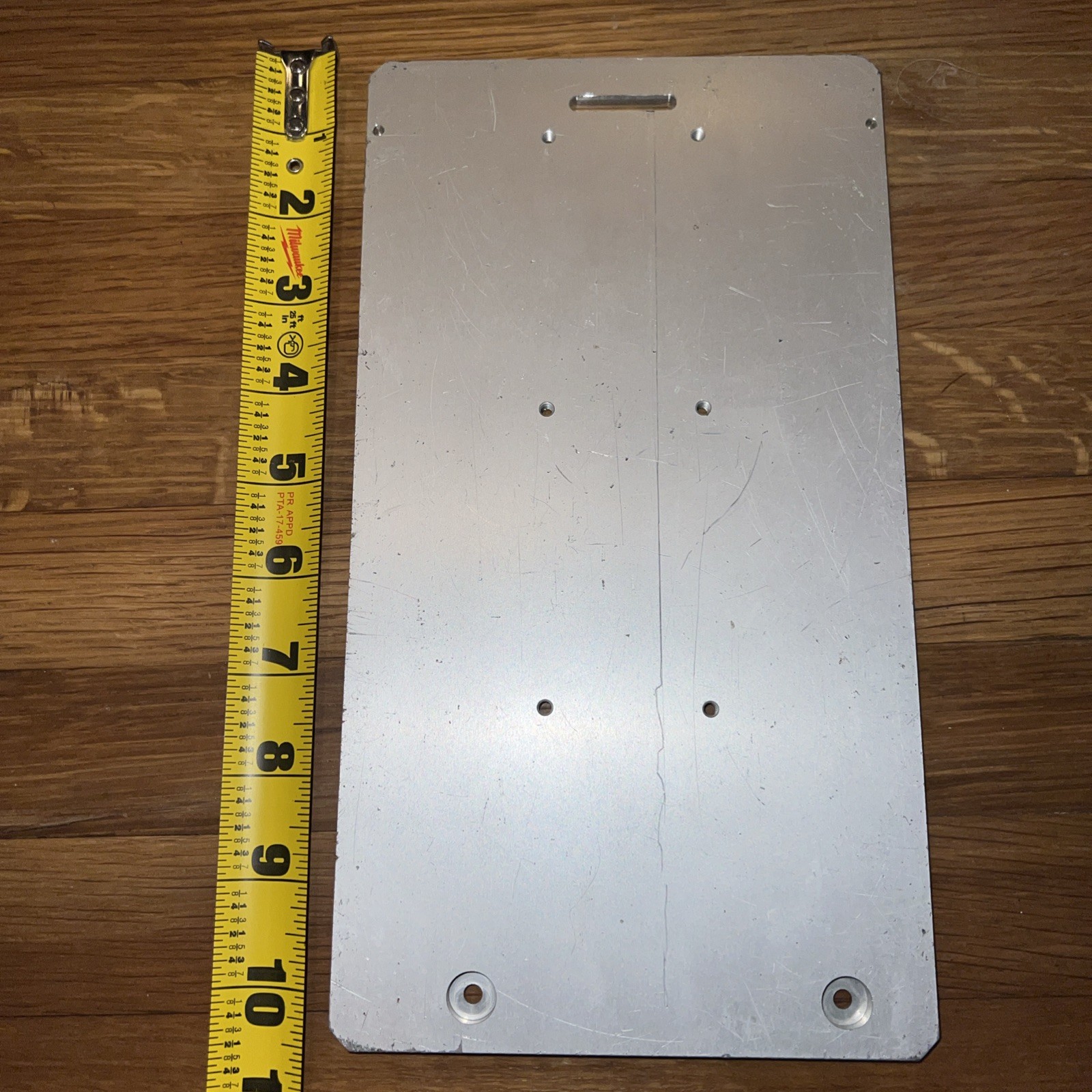 1/4″ Steel Plate, 10.5” x 5 5/16” with 8 screw holes