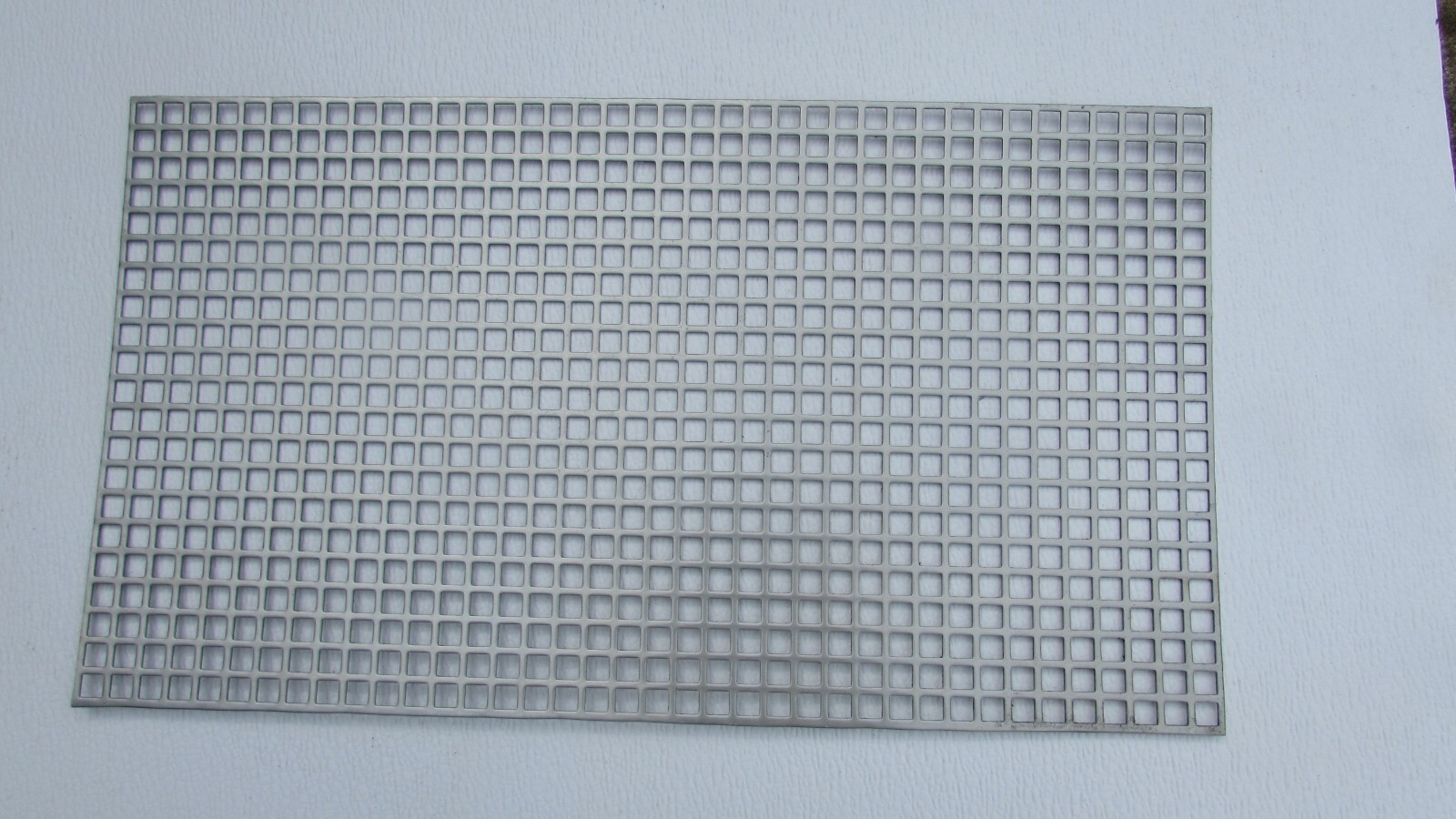 3/8″ SQUARE—- 16 GA. STAINLESS PERFORATED METAL —12″ x 12″