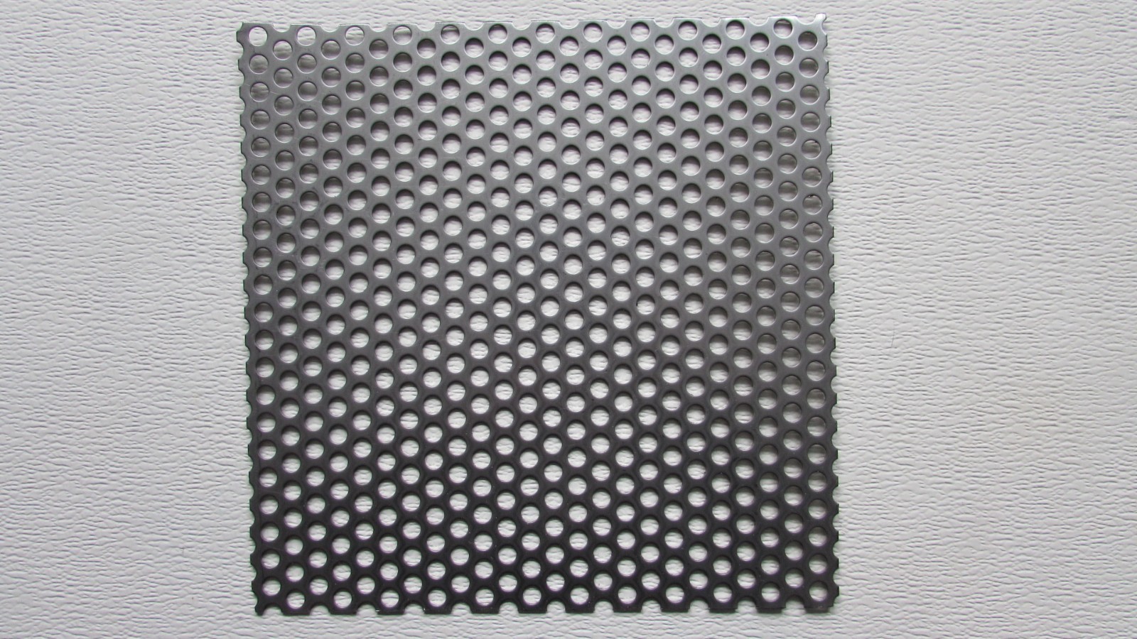 3/8″ HOLE 16 GAUGE 304 STAINLESS STEEL PERFORATED SHEET–12″ x 12″
