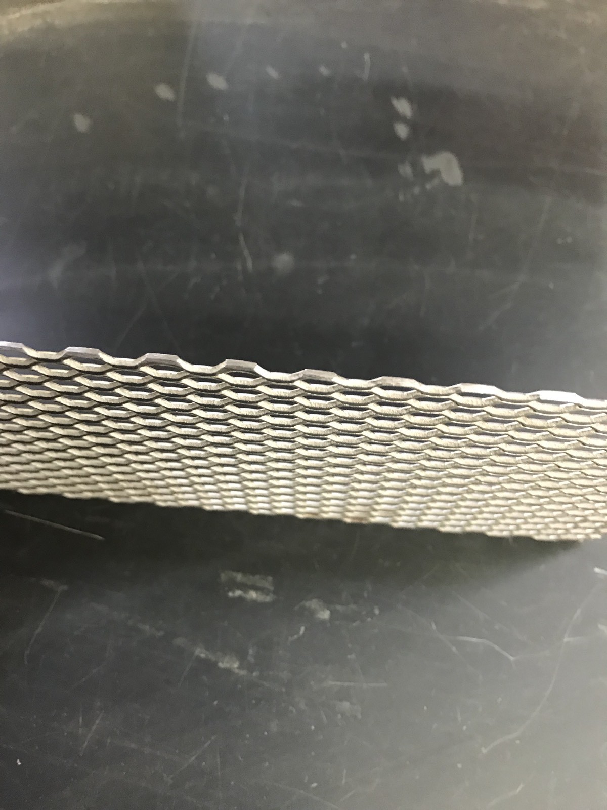 Qty Of One (1) Titanium Mesh for Anodizing or Plating. .078″ thick with Lug