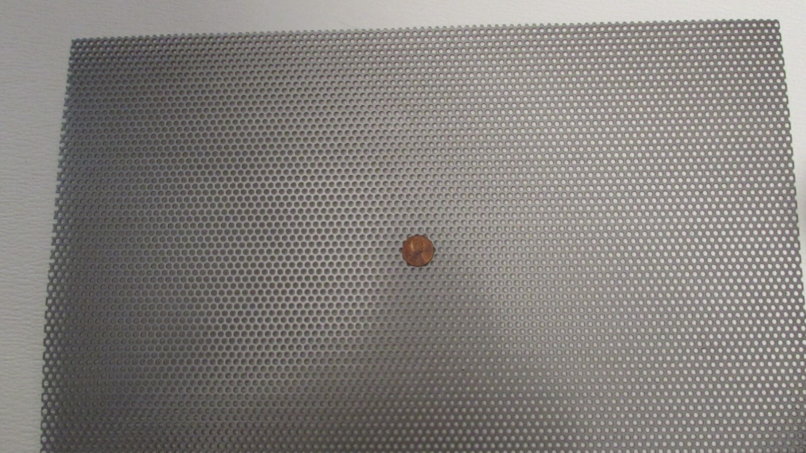 1/8″ HOLES ON 3/16″ CENTERS–20 GAUGE STAINLESS PERFORATED– 11″ x 10″